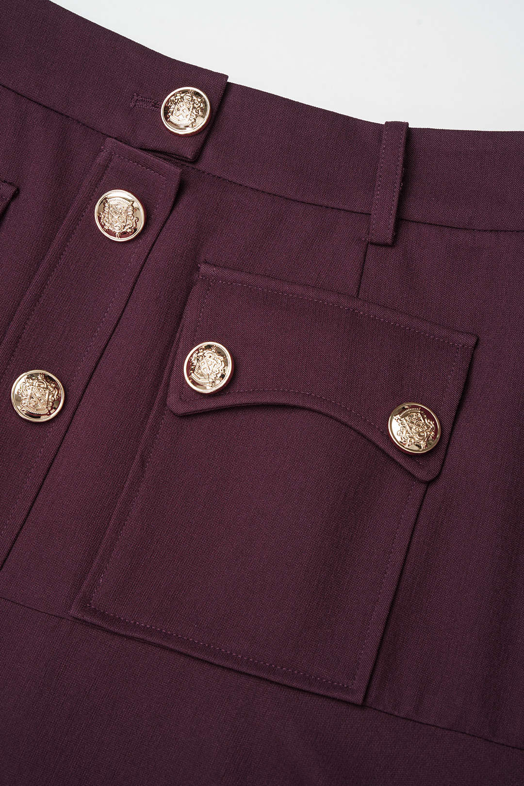 Metallic midirok met knoopjes en hoge taille