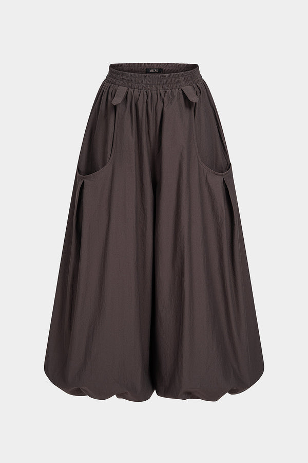 Effen broek met smokwerk en ballonmodel