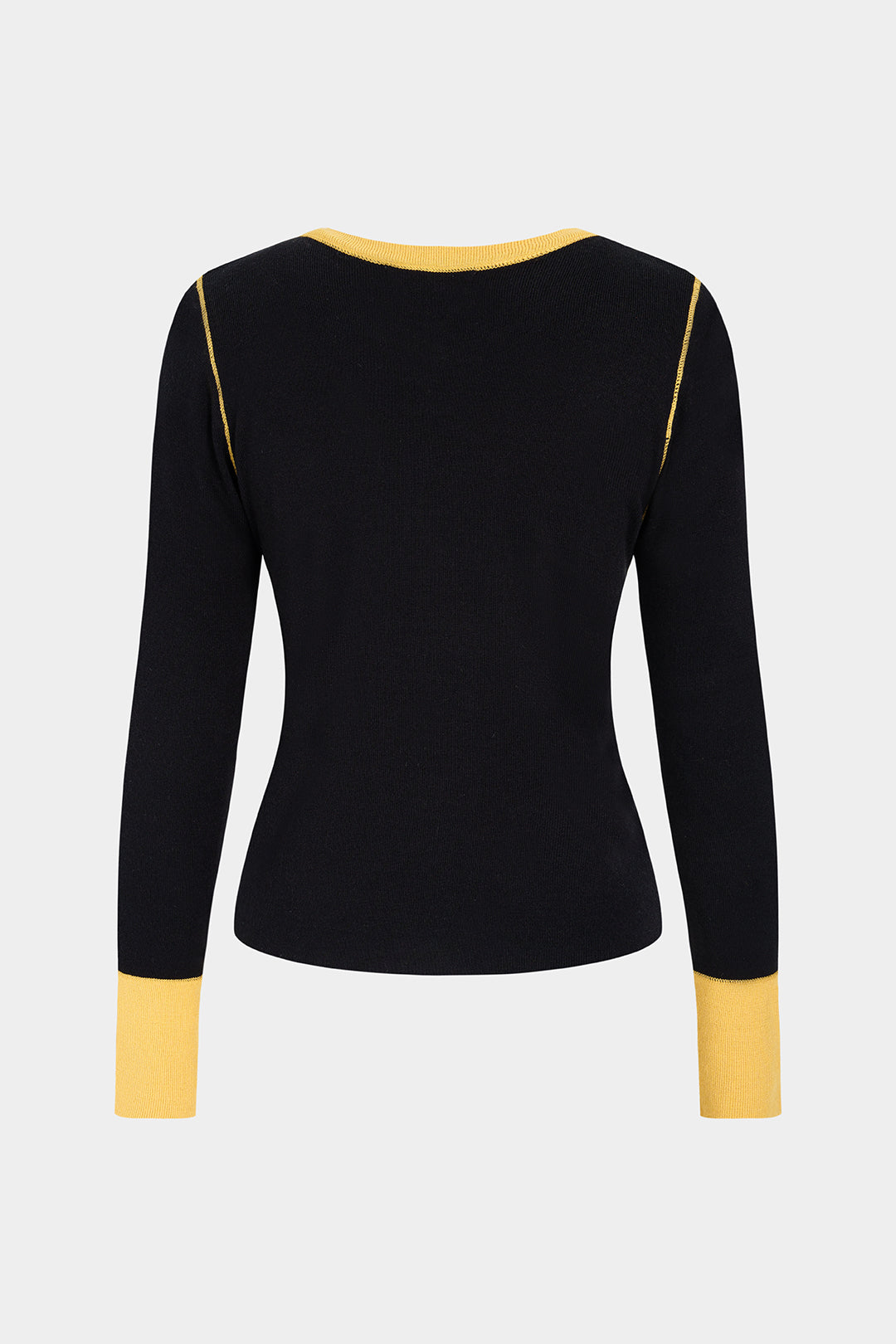 Thea - Gebreide top met knoopjes en lange mouwen