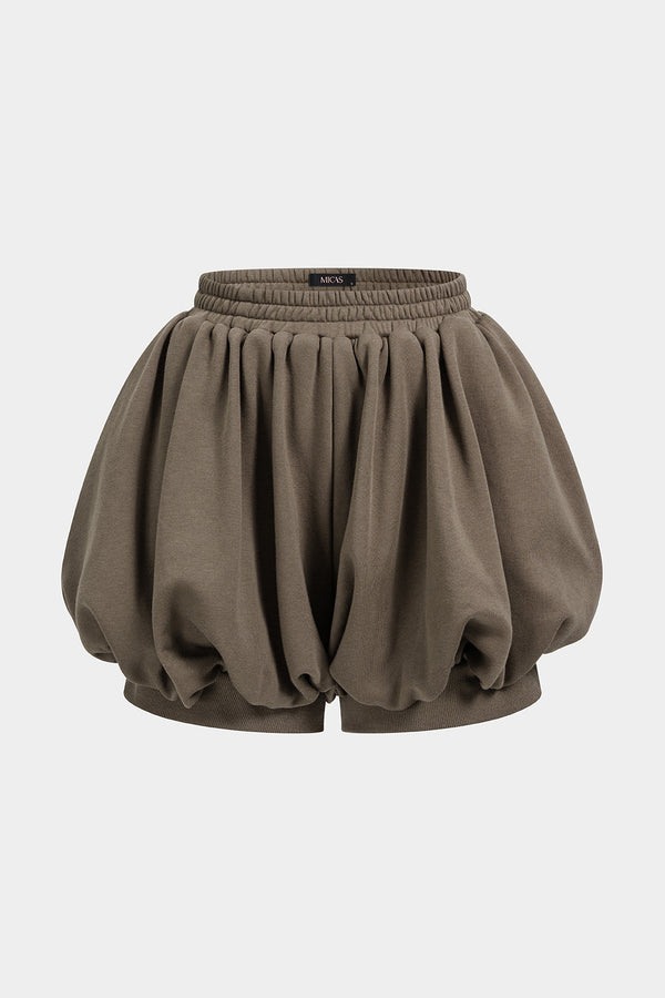 Effen short met smokwerk en ruches