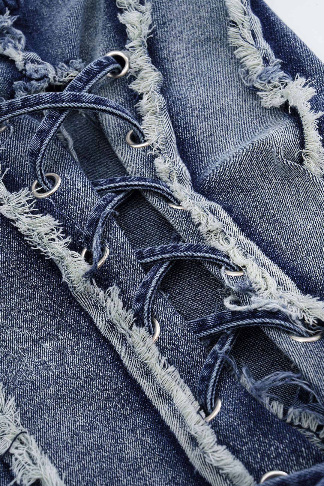 Asymmetrische denim minijurk met rafelrand