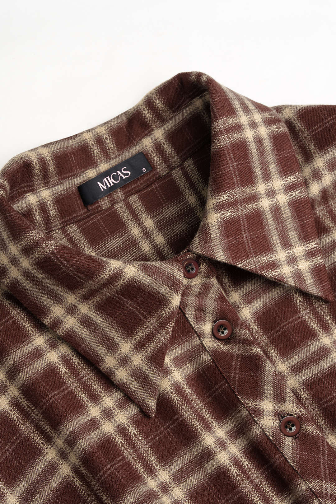 Noor - Geruite blouse met knoopjes en lange mouwen