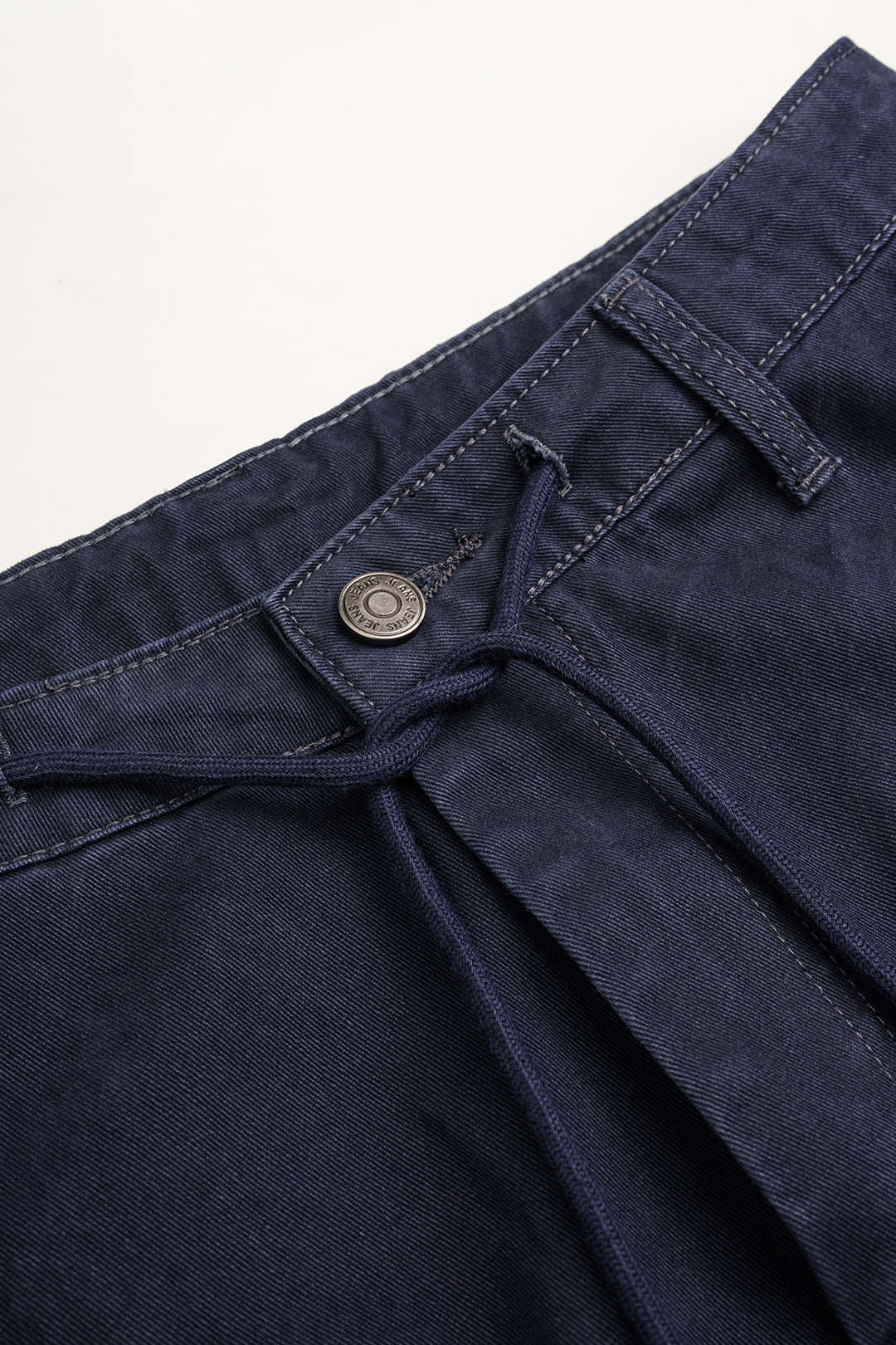 Jeans met strik en zakken