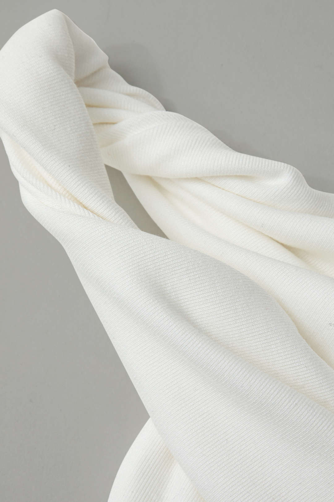 Asymmetrische mouwloze top met gedraaid detail