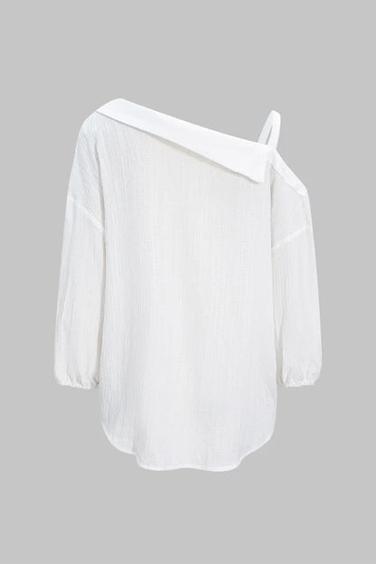 Asymmetrische mouwloze blouse met knoopsluiting en open rug