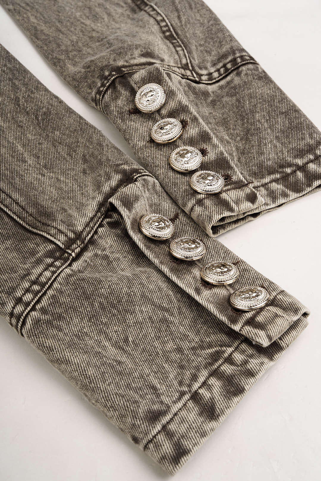 Denim asymmetrisch jasje met dubbele knopenrij