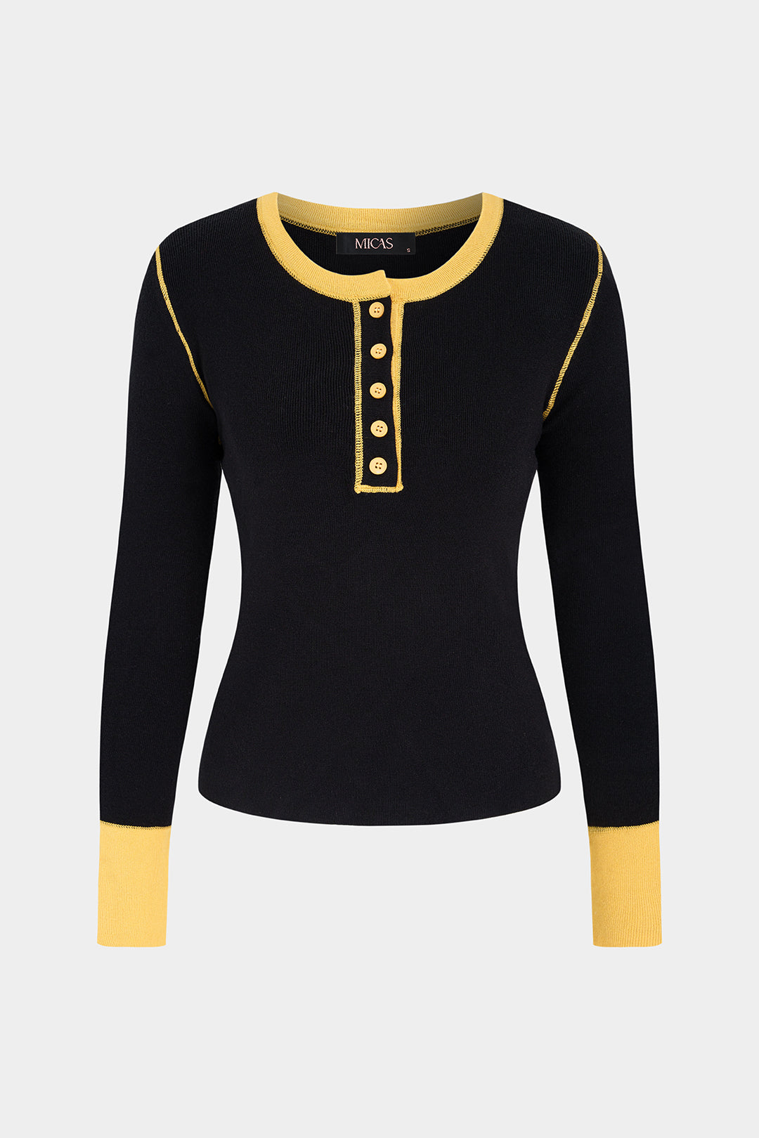 Thea - Gebreide top met knoopjes en lange mouwen