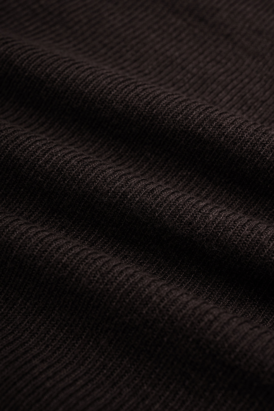 Gebreide top met V-hals, knoopdetail en lange mouwen