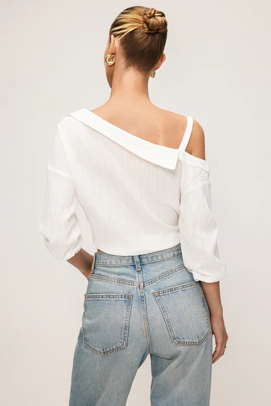 Asymmetrische mouwloze blouse met knoopsluiting en open rug