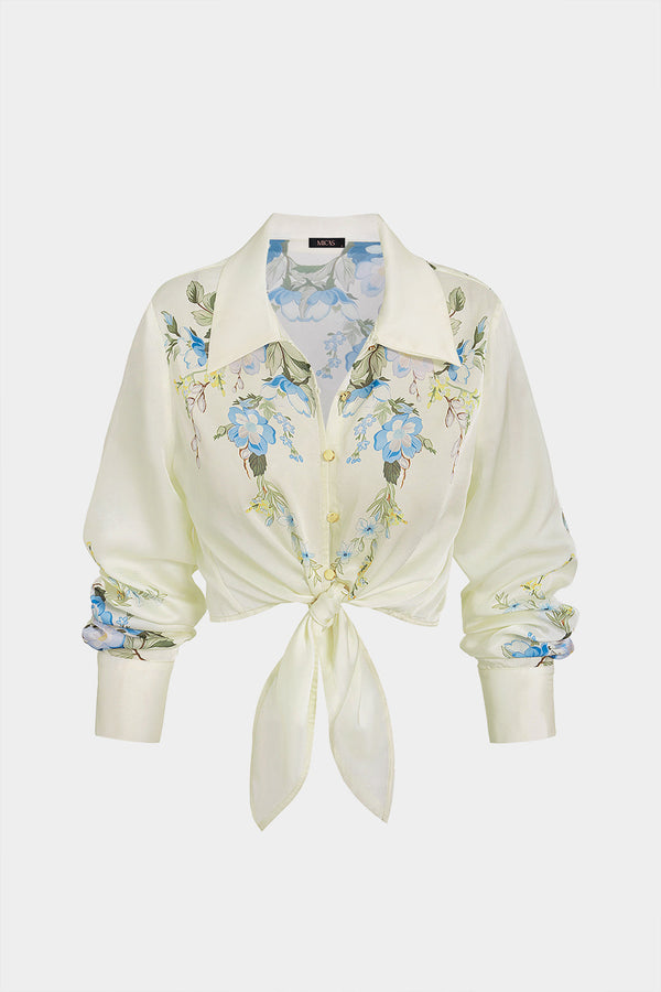 Bloemenprint metallic blouse met knoopjes en knoopdetail