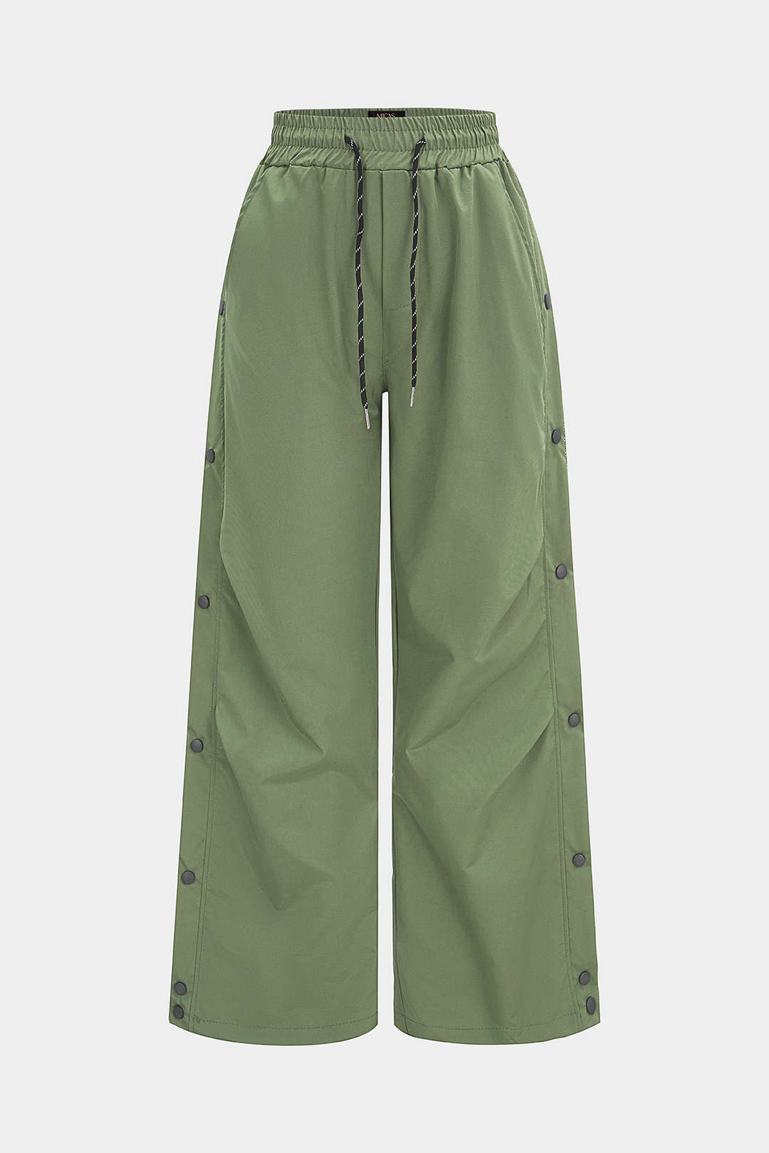 Broek met trekkoord, ruches en knoopjes