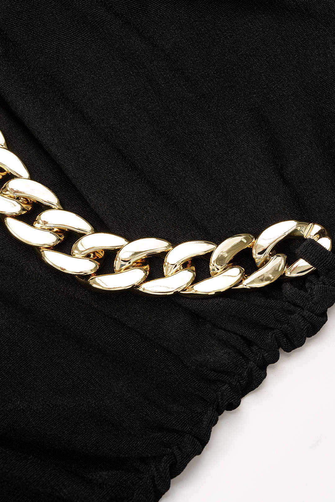 Metallic minijurk met V-hals en lange mouwen