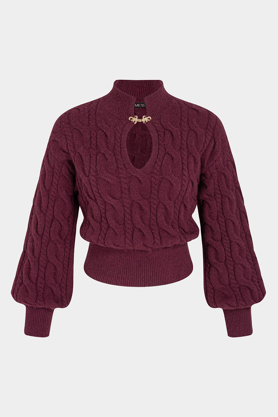 Gebreide metallic top met uitsnijding en brandenburgsluiting