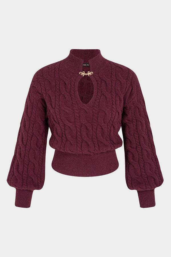 Gebreide metallic top met uitsnijding en brandenburgsluiting