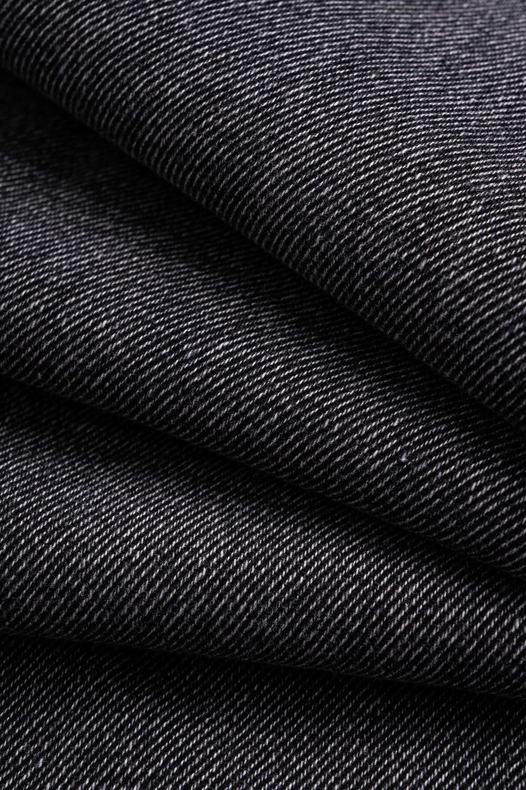 Asymmetrische jeans met zakken en wijde pijpen