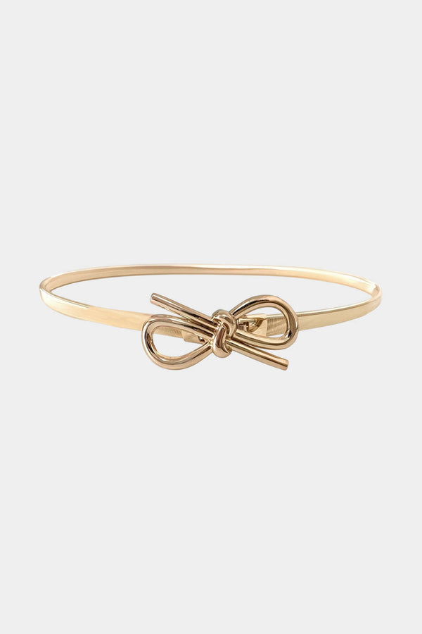 Metallic item met strik en kettingdetail