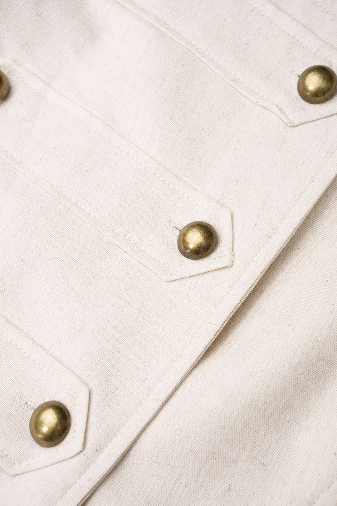 Metallic mouwloze minijurk met dubbele knopenrij
