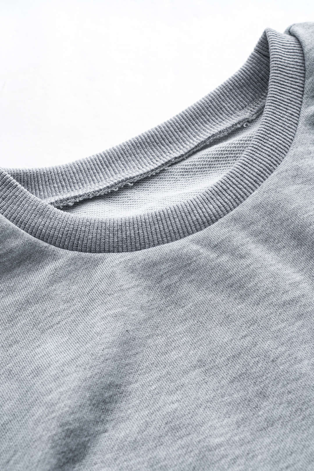 Sweater met ronde hals, riem en lange mouwen