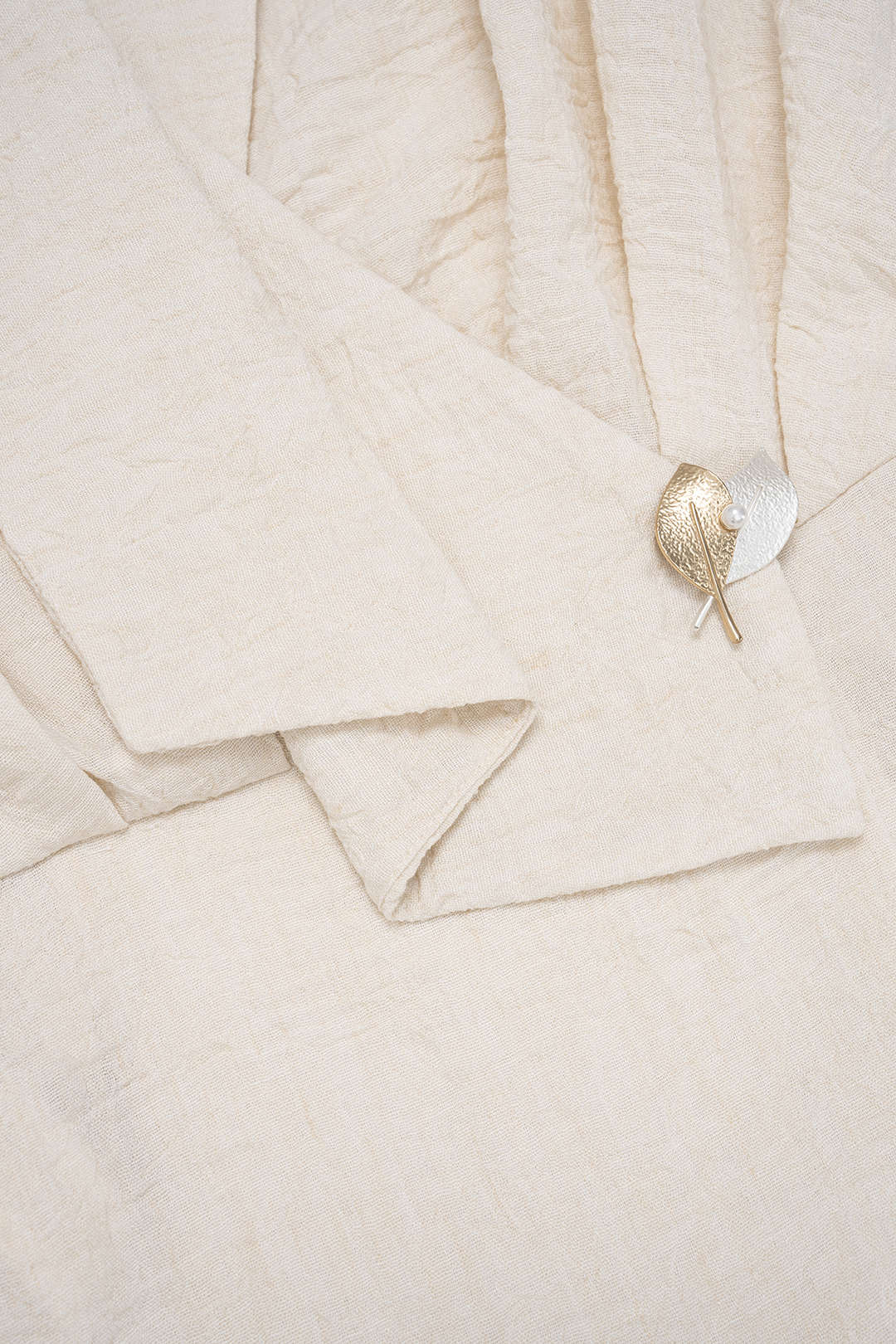 Asymmetrische blouse met V-hals en ruches
