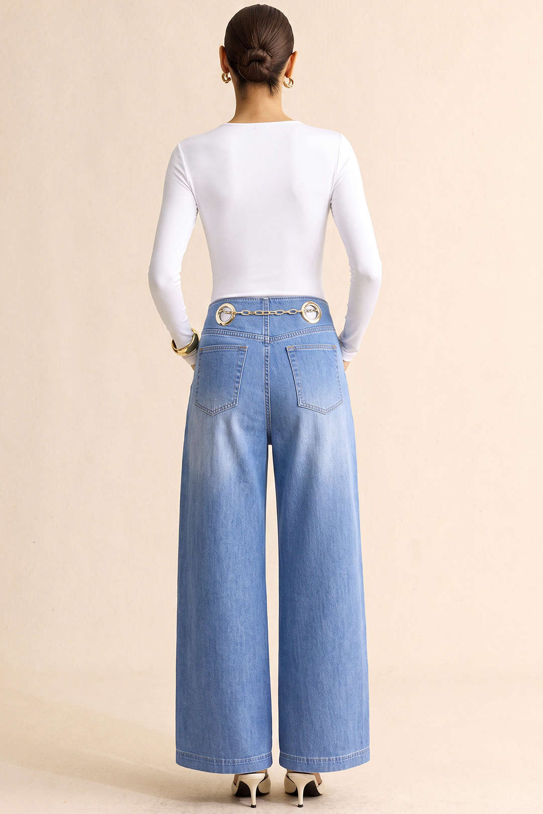Metallic jeans met kettingdetail en wijde pijpen