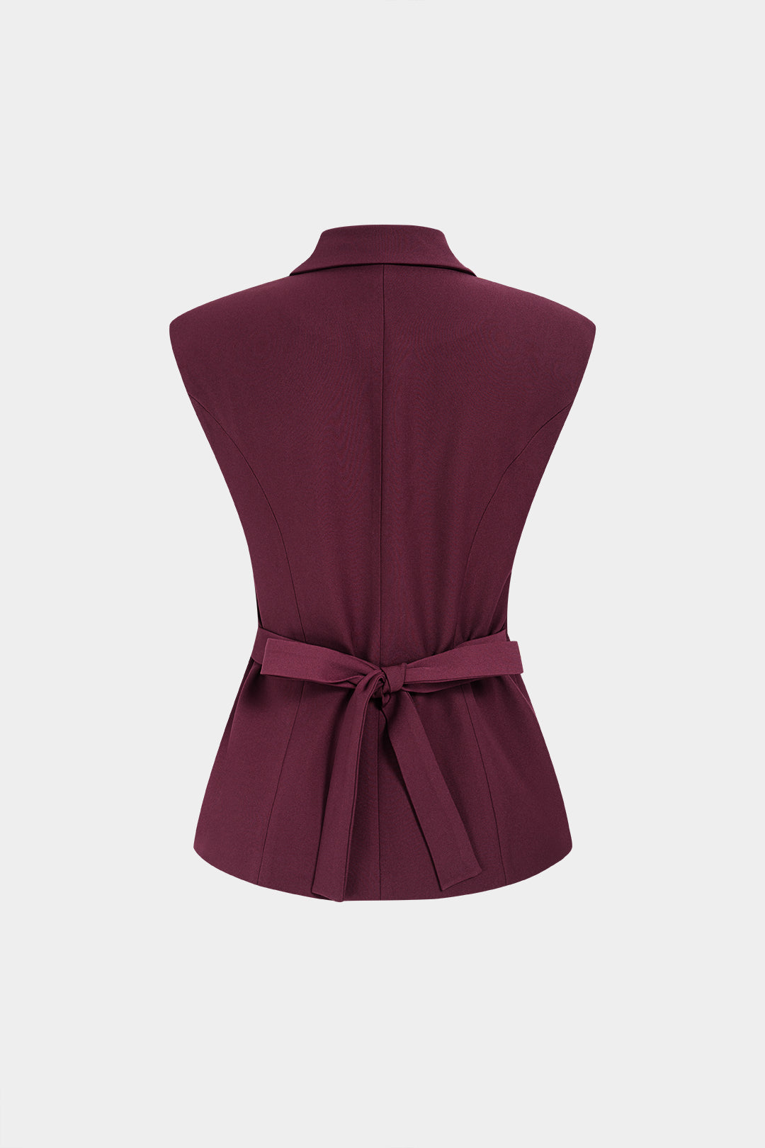 Asymmetrisch gilet met reverskraag en knoopjes