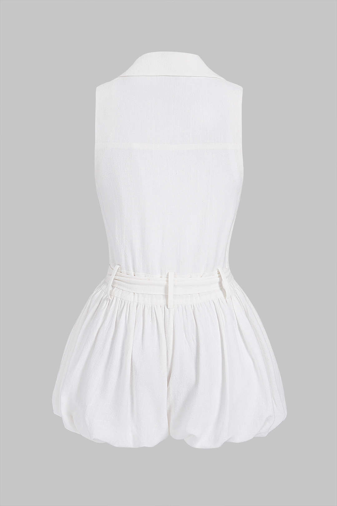 Mouwloze playsuit met ruches en strik