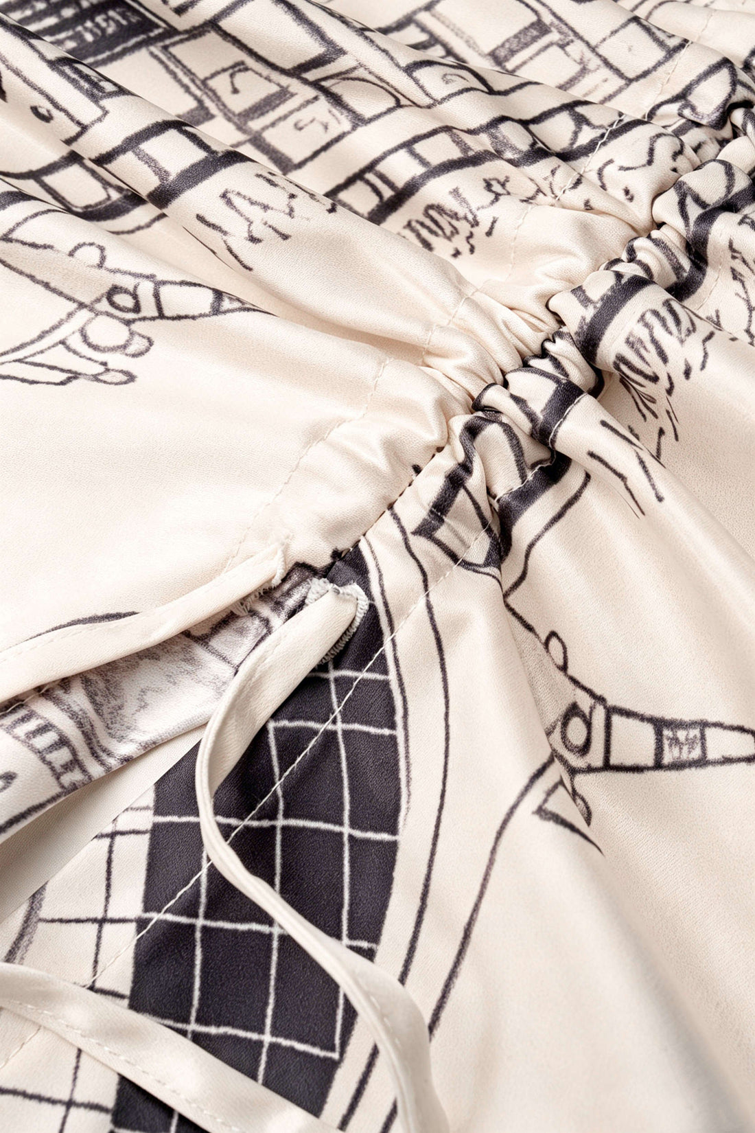 Asymmetrische rok met trekkoord en ruches
