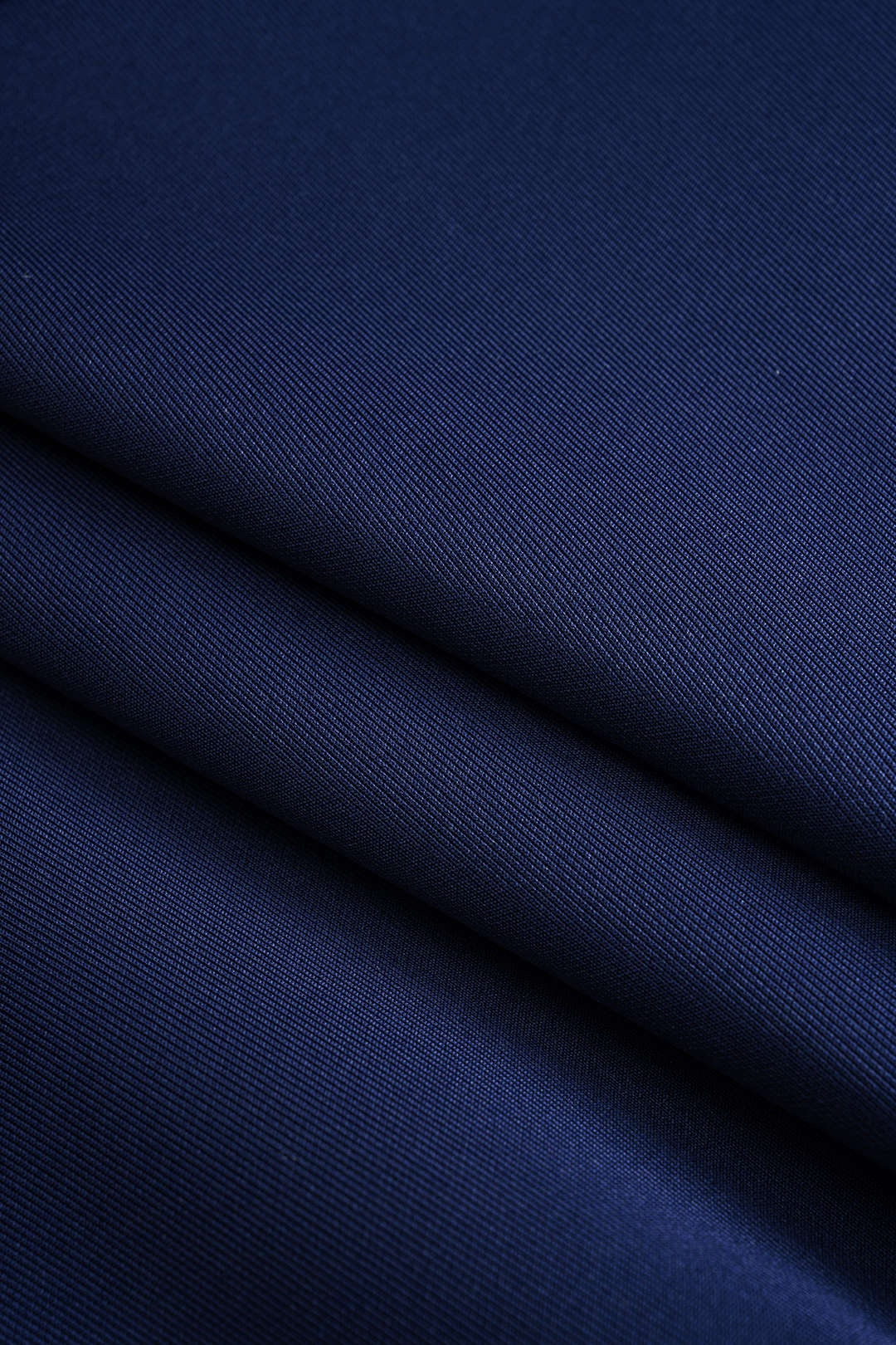 Denim patchwork jasje met smokwerk en rits
