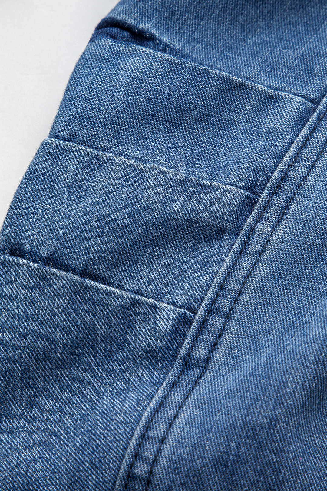 Denim patchwork item met knoopjes, ronde hals en zakken