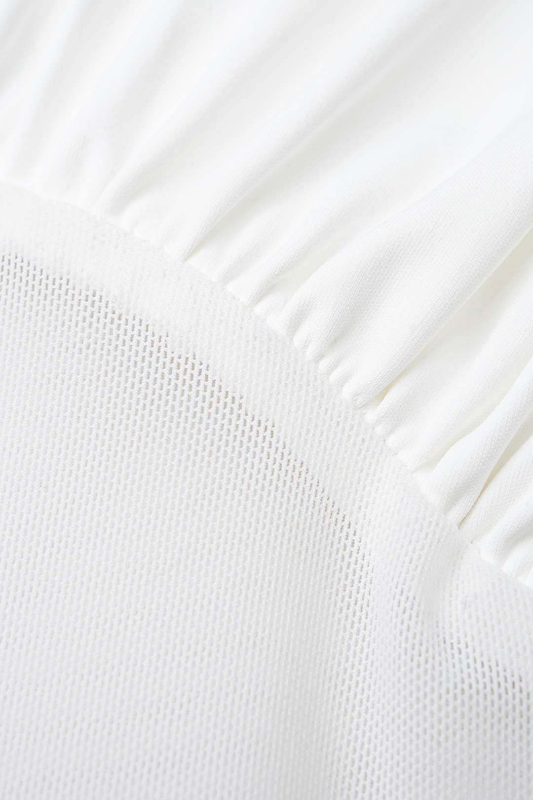 Mesh patchwork body met ruches