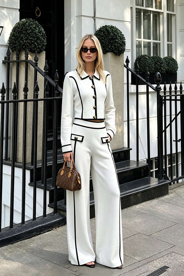 Gebreide metallic top met knoopjes en lange mouwen