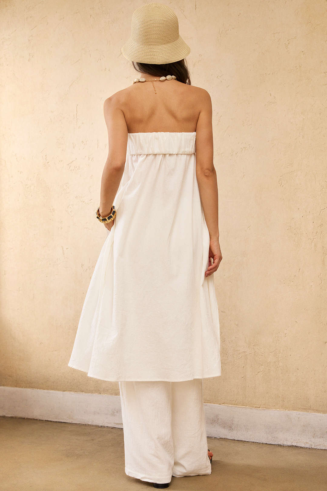 Asymmetrische strapless top met ruches