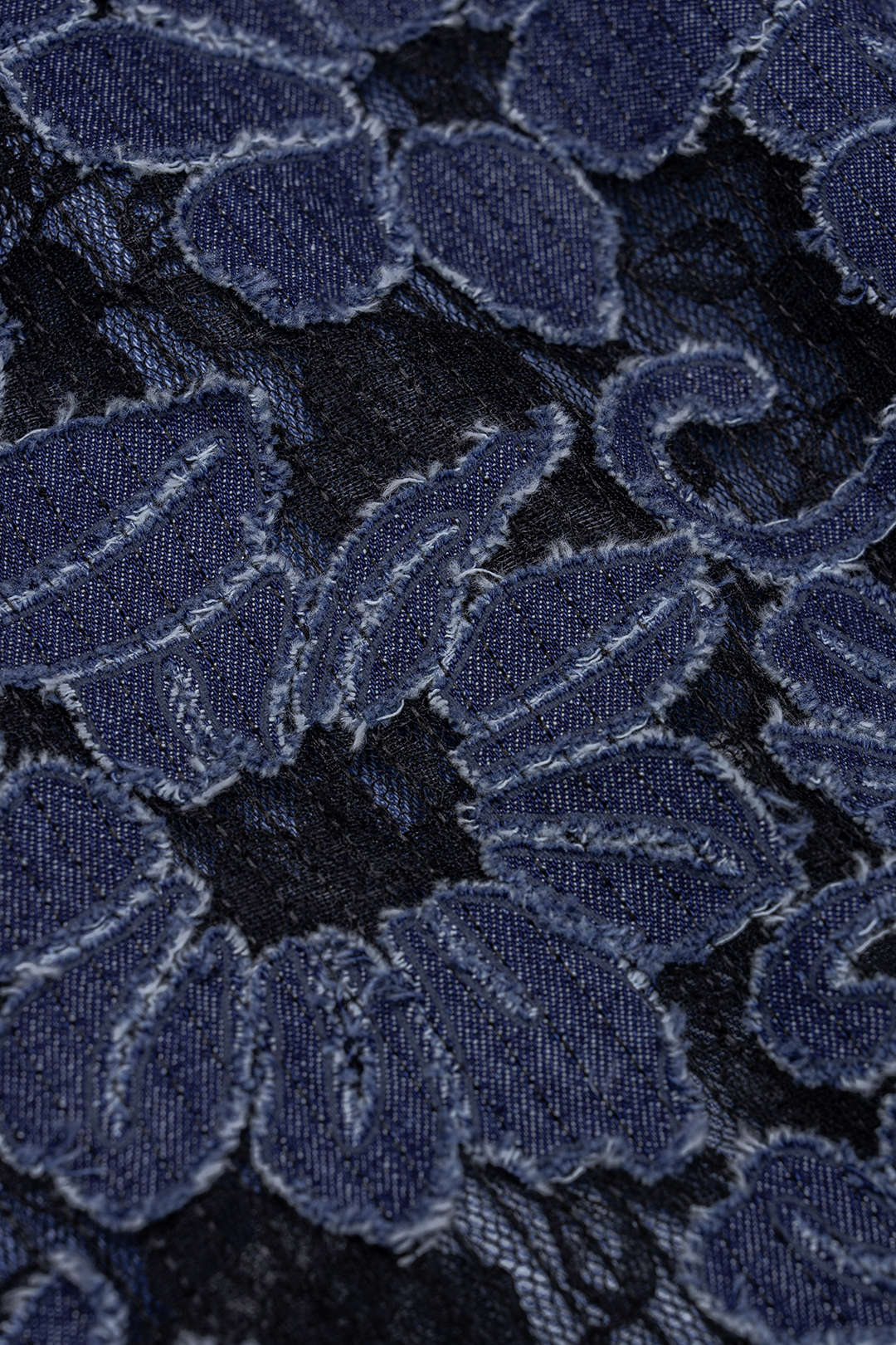 Denim patchwork rok met rits en rafelrand