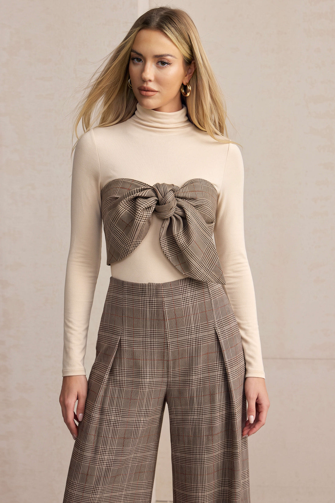 Geruite patchwork body met opstaande kraag en lange mouwen