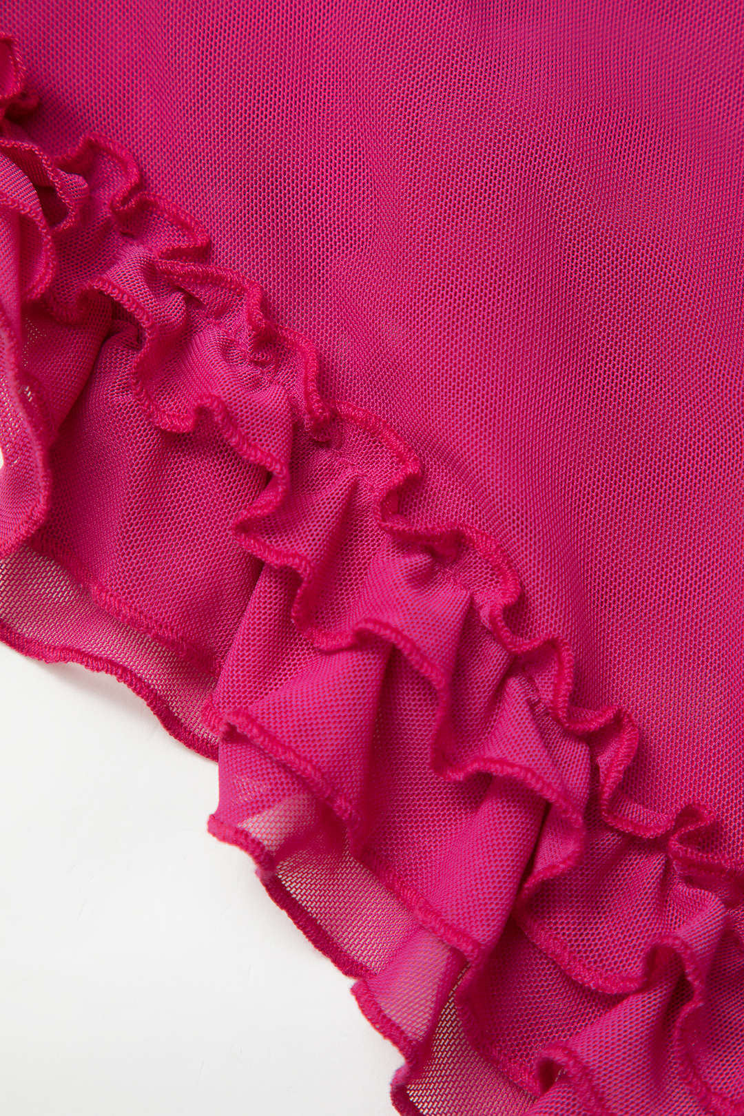 Transparante mesh minijurk met volants en open rug
