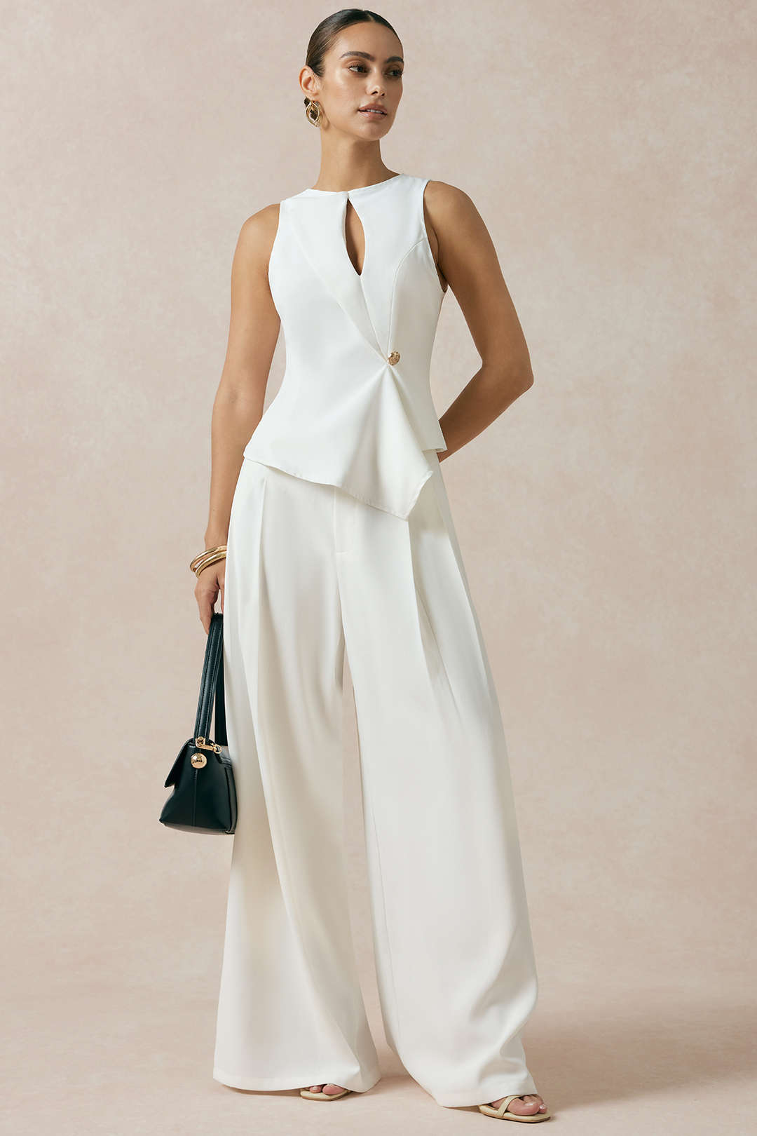 Asymmetrische tanktop met uitsnijding en knoopjes