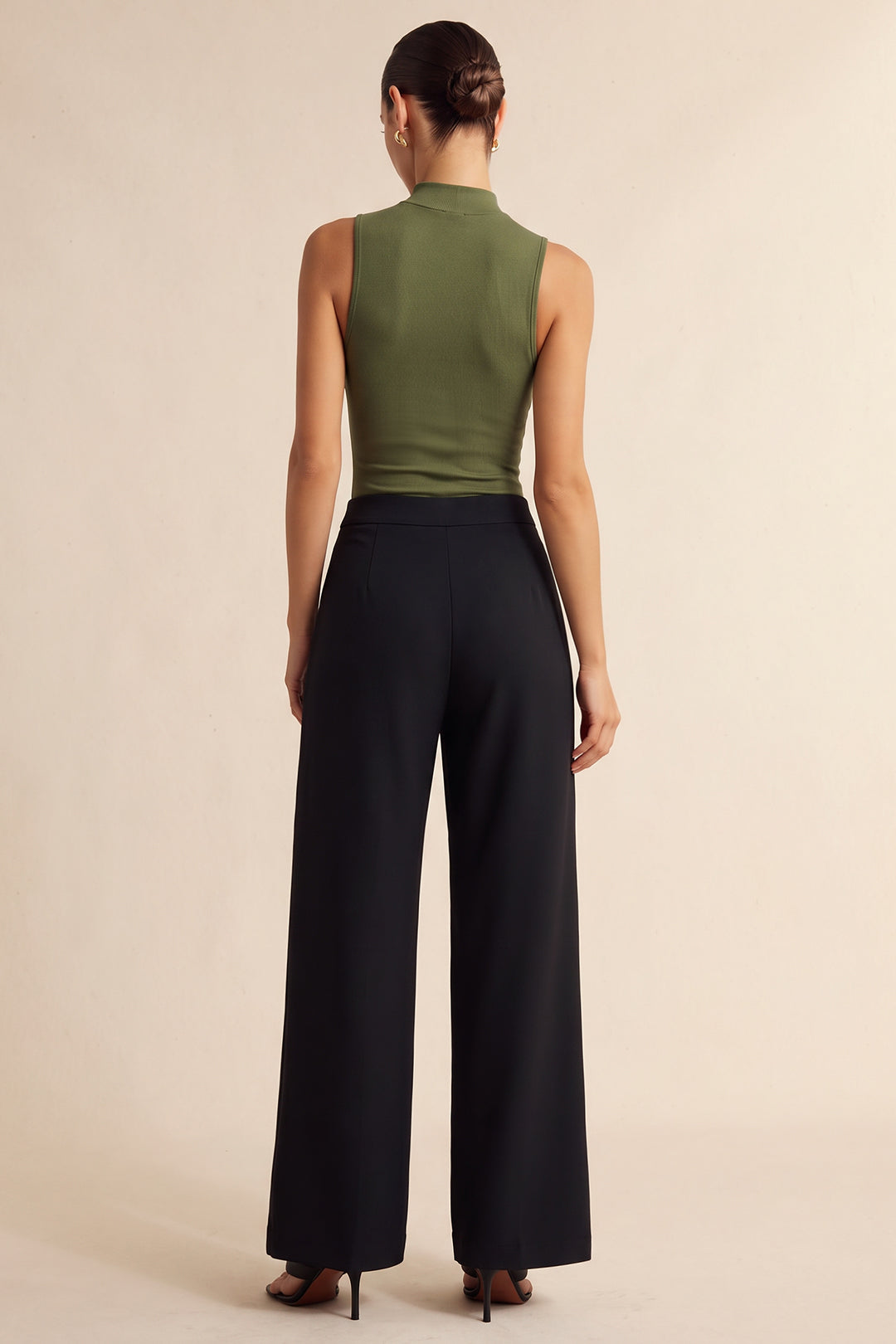 Leren-look patchwork body met knoopdetail