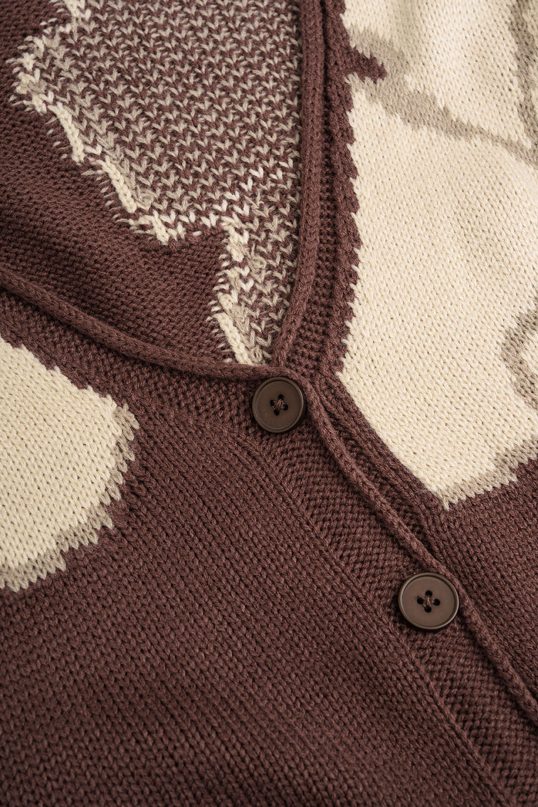 Gebreid jacquard vest met knoopjes en V-hals