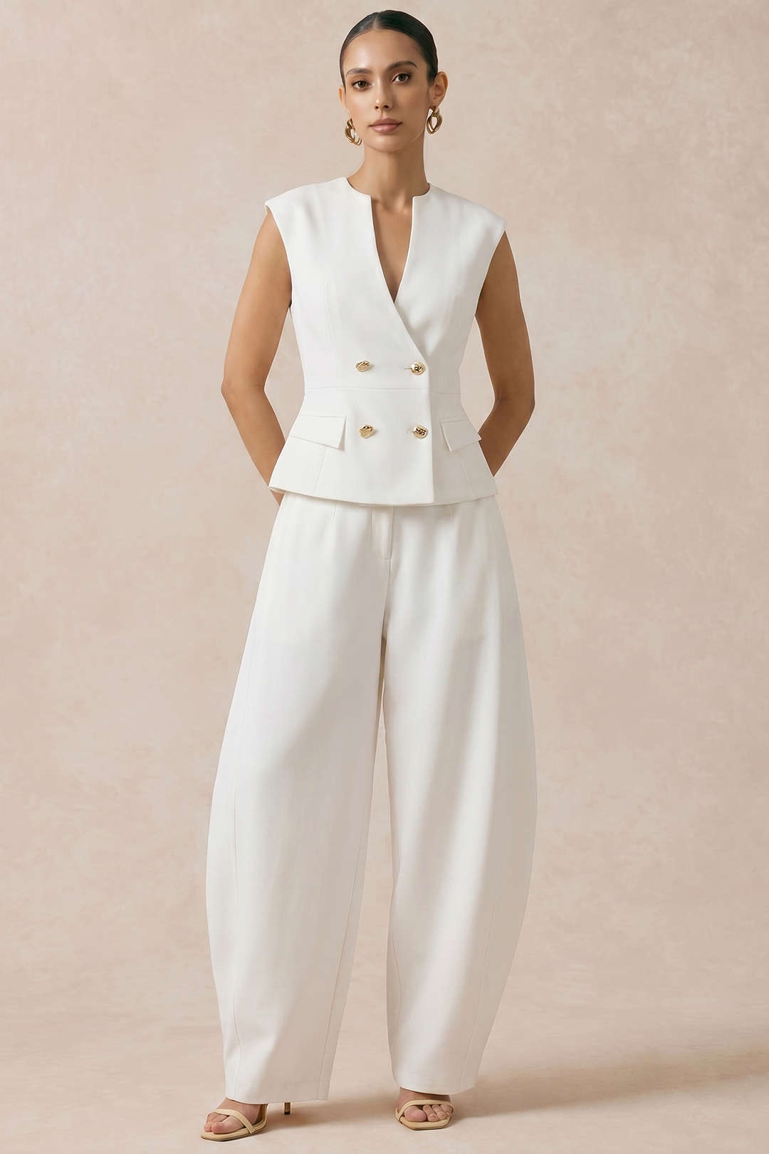 Metallic gilet met knoopjes en V-hals