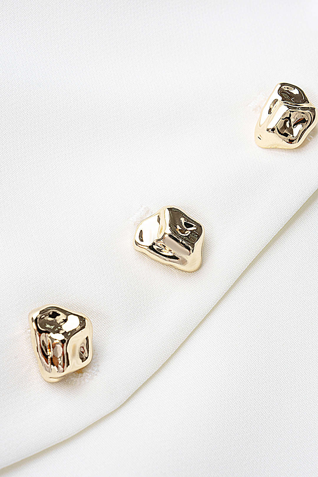 Metallic gilet met V-hals en knoopjes