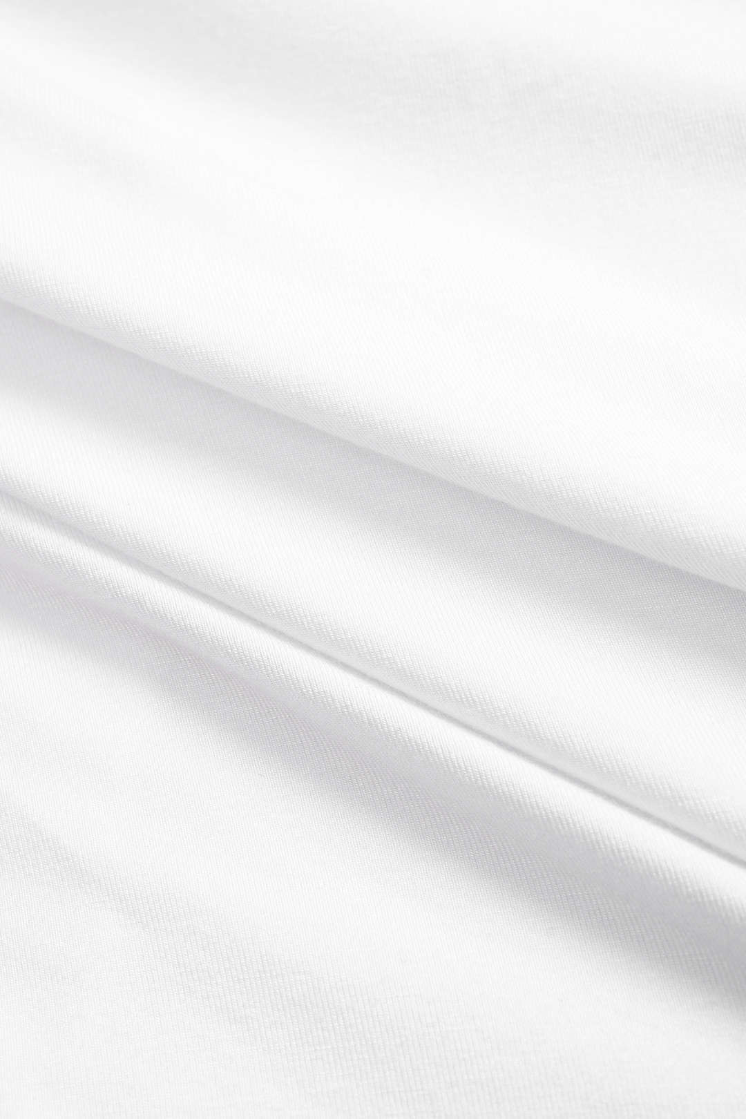 Asymmetrische rok met ruches, kettingdetail en split