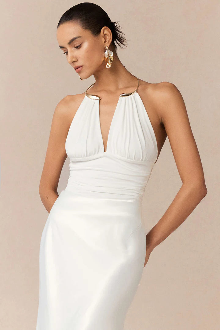 Bodysuit with metallic details, halter neck and open back