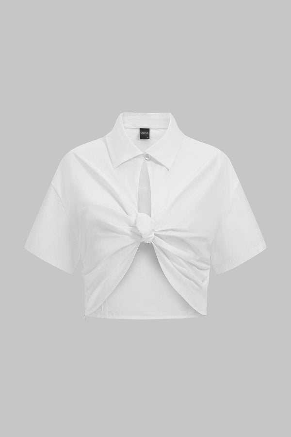 Blouse met revers, ruches en uitsnijding