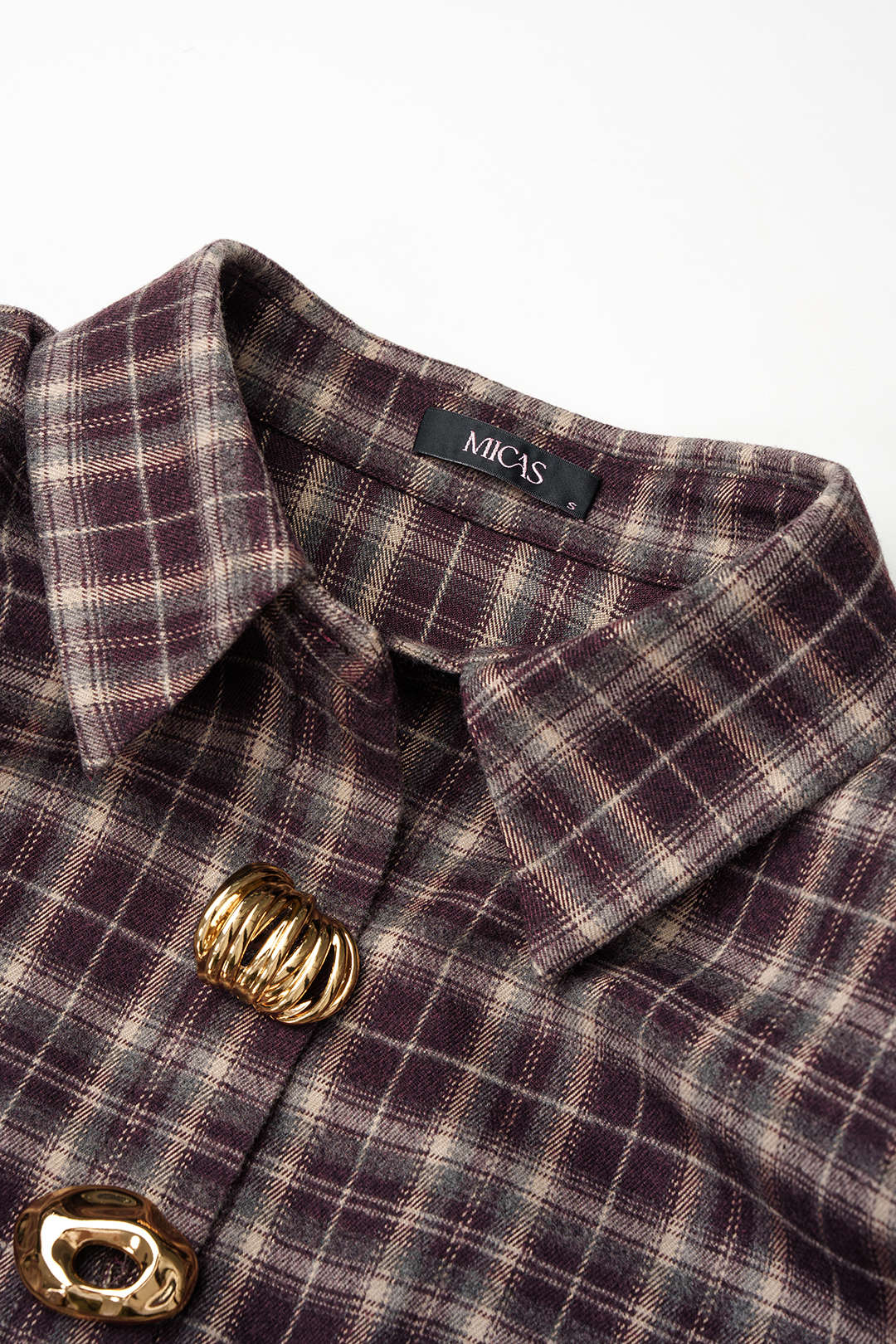 Geruite metallic blouse met knoopjes, strik en lange mouwen