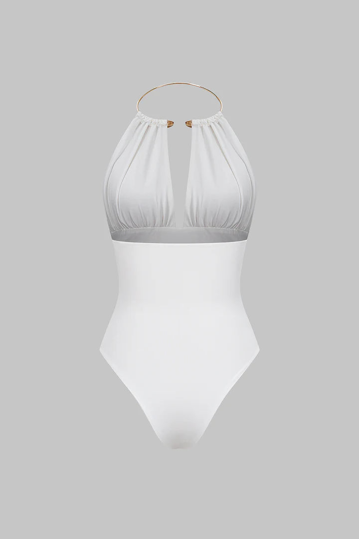 Bodysuit with metallic details, halter neck and open back