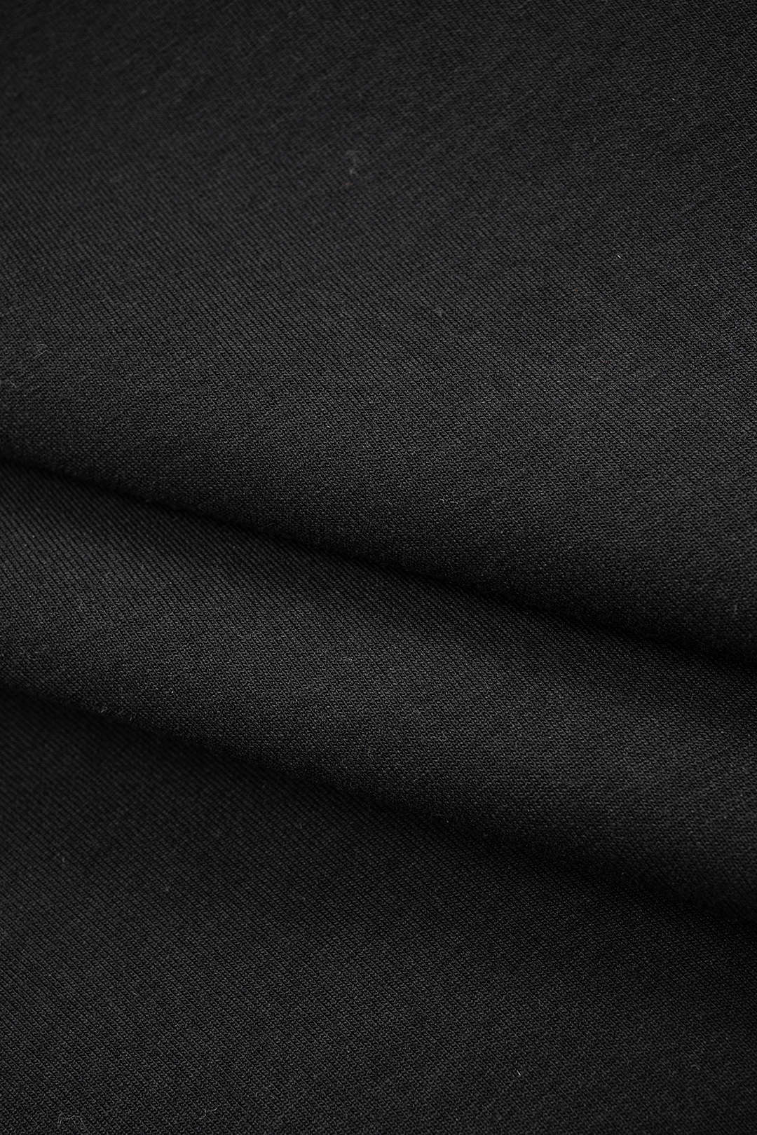 Metallic top met ronde hals en opengewerkt detail