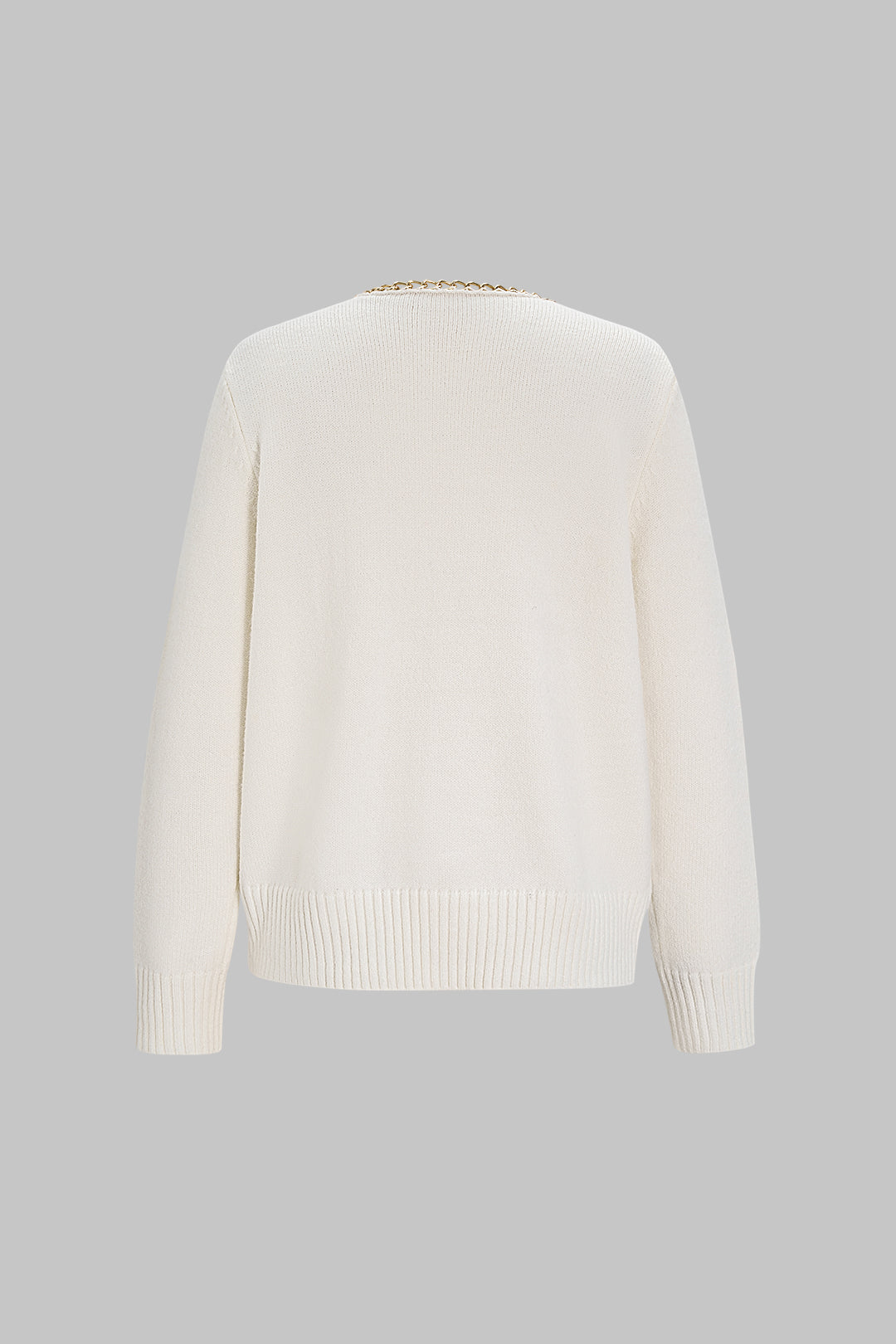 Gebreide top met V-hals, kettingdetail en lange mouwen