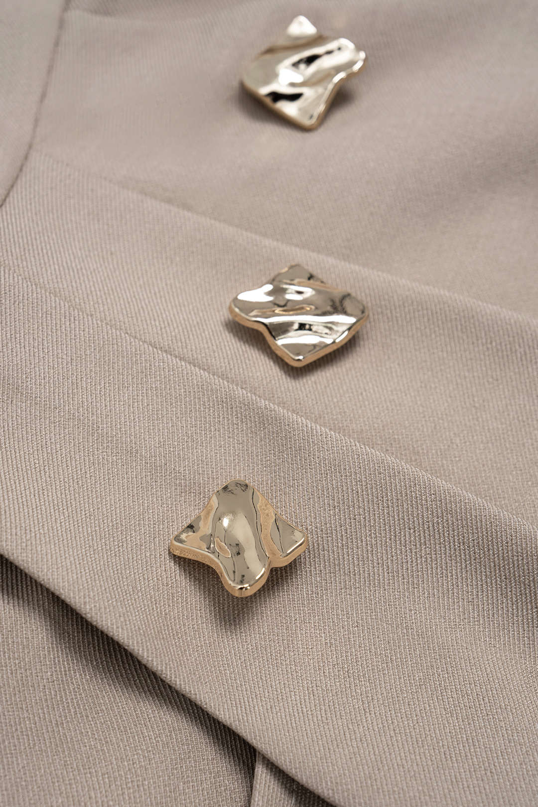 Metallic asymmetrische blouse met één schouder en rits
