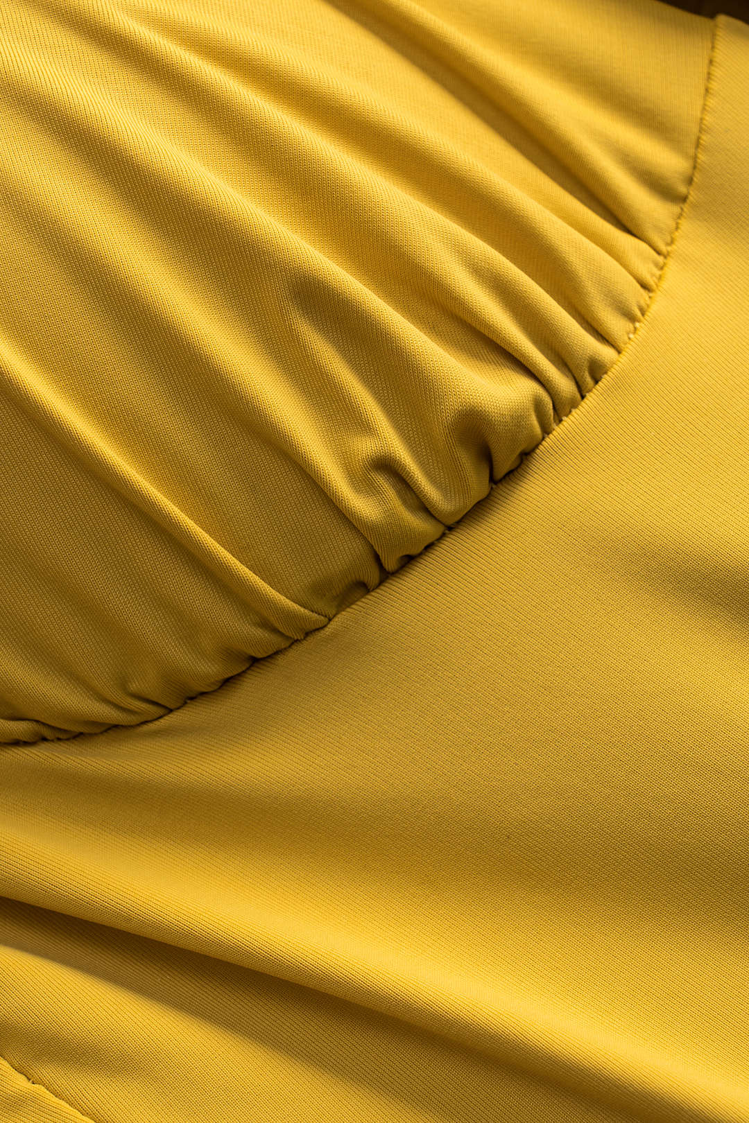Mouwloze body met ruches en open rug