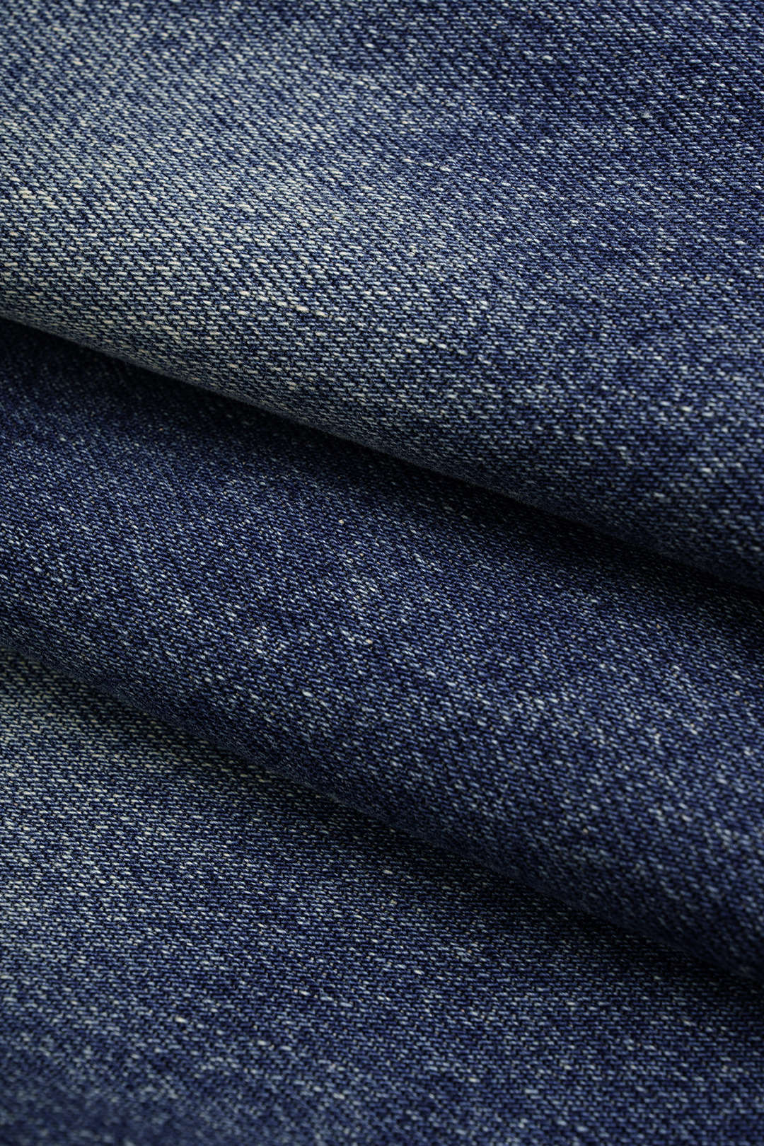 Denim asymmetrische short met rafelrand en wijde pijpen